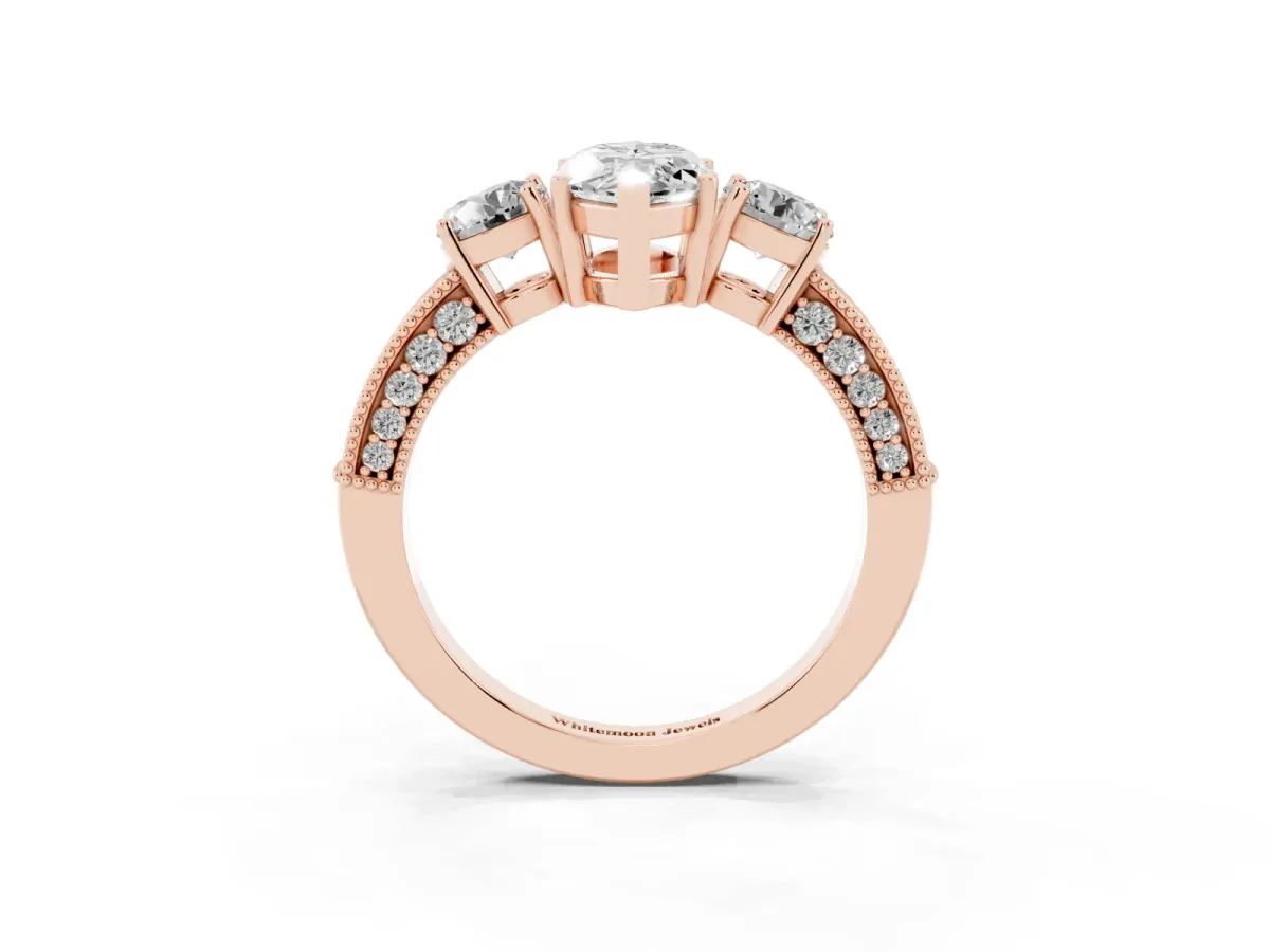 Marquise Cut Three-Stone Diamond Ring with Pavé Band and Four-Prong Setting Rose gold