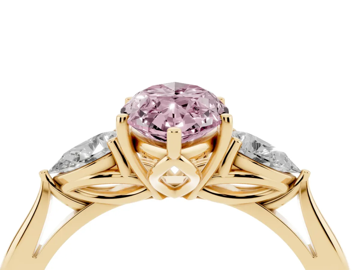 Fancy Pink Three-Stone Marquise Cut Brilliant Diamond Solitaire Ring with Tapered Band and Four-Prong Setting Yellow gold