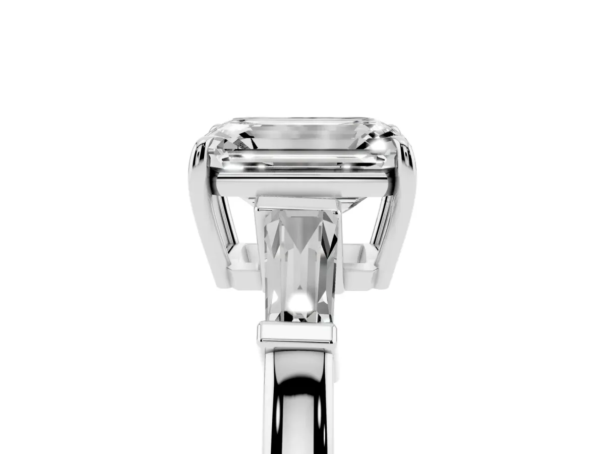 Emerald Cut Diamond Three-Stone Ring with Tapered Baguette Side Stones and Prong Setting White gold