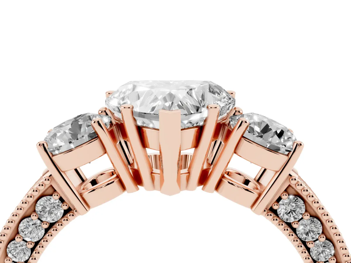 Heart Cut Three-Stone Diamond Ring with Pavé Band and Four-Prong Setting Rose gold