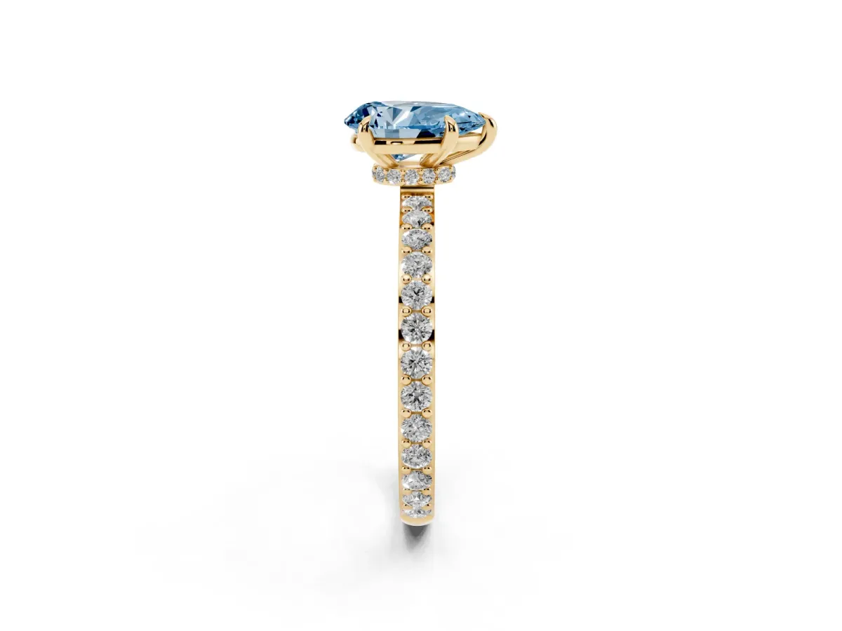 Fancy Blue Pear Cut Diamond Pavé Engagement Ring with Round Accents and Prong Setting Yellow gold