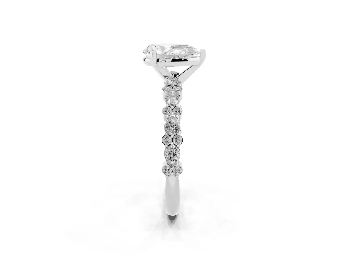 Pear Cut Diamond Side Stone Solitaire Ring with Round and Four-Prong Setting Silver
