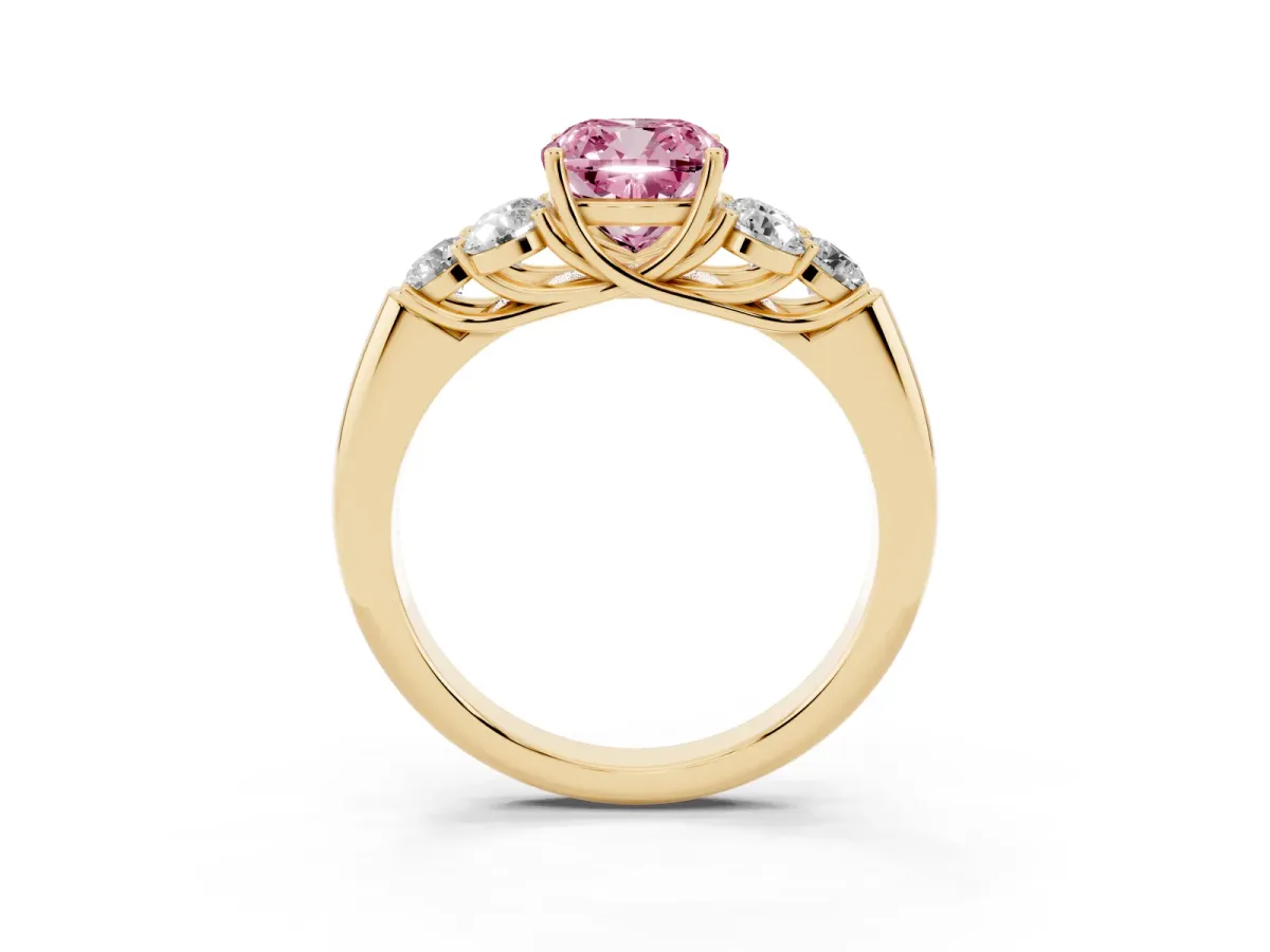 Fancy Pink Cushion Cut Cut Diamond Cluster Ring with Round Accent Stones and Prong Setting on a Classic Band Yellow gold