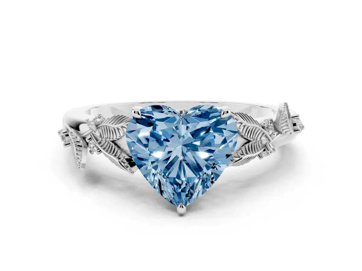 Fancy Blue Heart Cut Diamond Solitaire Ring with Leaf Motif Band and Four-Prong Setting Platinum