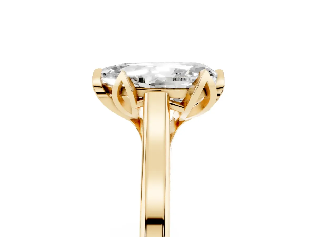Pear Cut Diamond Solitaire Ring with Flower Prong Setting and Classic Band Yellow gold