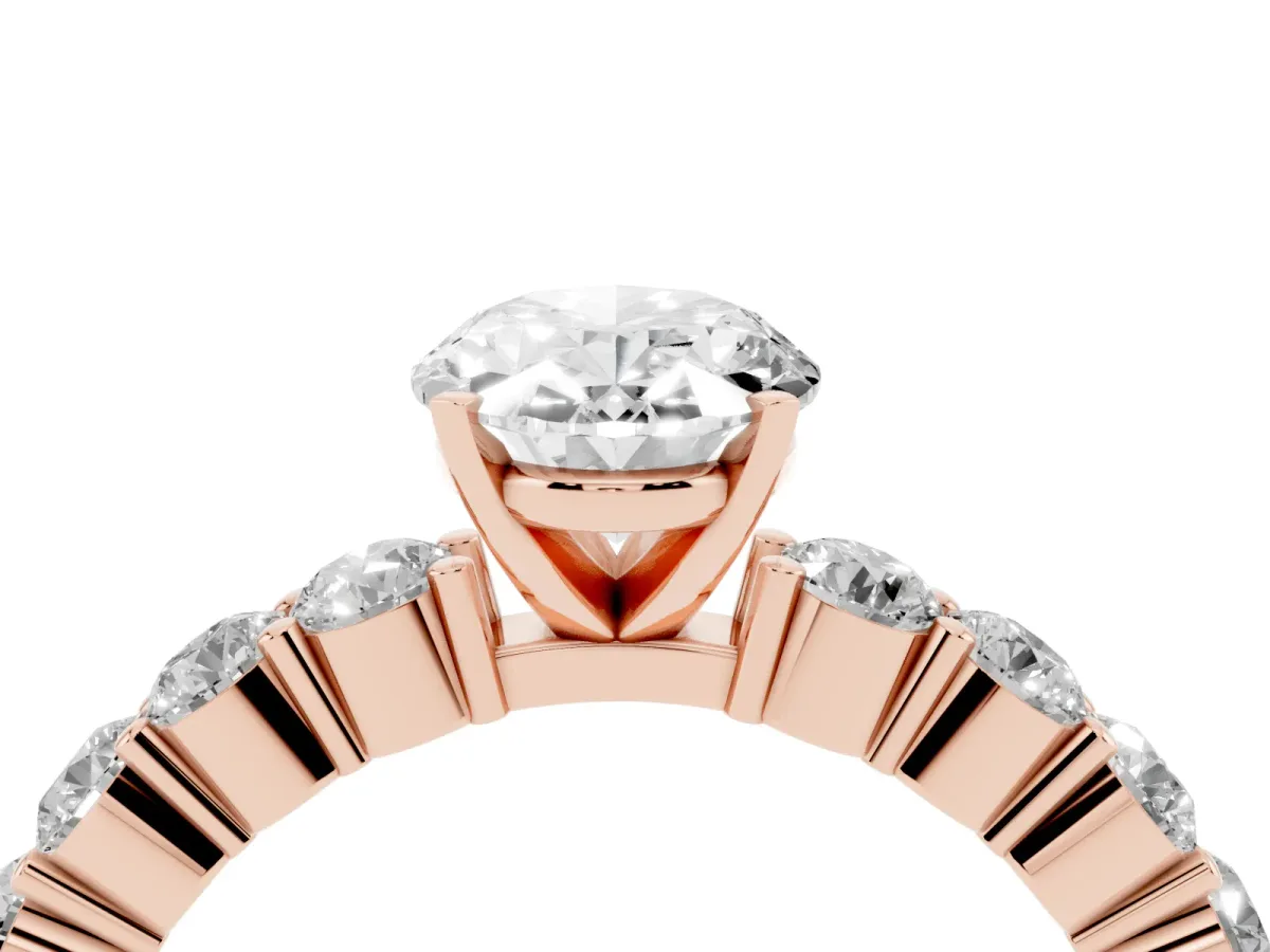 Oval Cut Diamond Solitaire Ring with Shared Prong Round Side Stones Rose gold