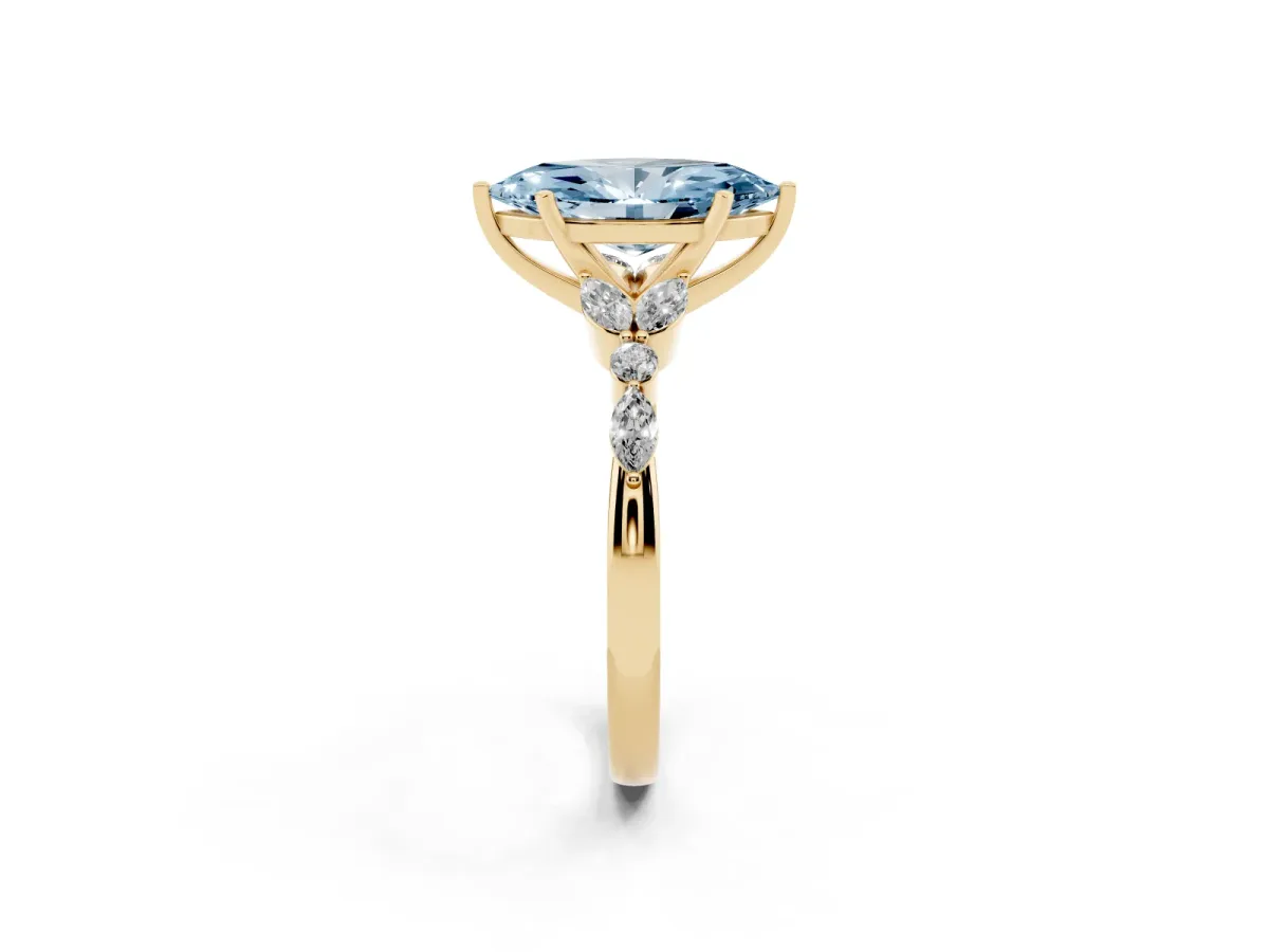 Fancy Blue Marquise Cut Diamond Solitaire Ring with Side Stones and Four-Prong Setting Yellow gold