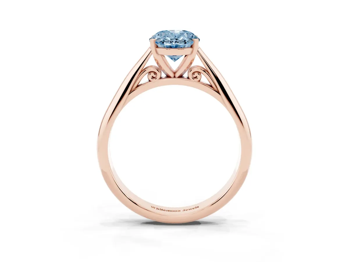 Fancy Blue Oval Cut Diamond Solitaire Engagement Ring with Cathedral Setting and Four-Prong Mount Rose gold