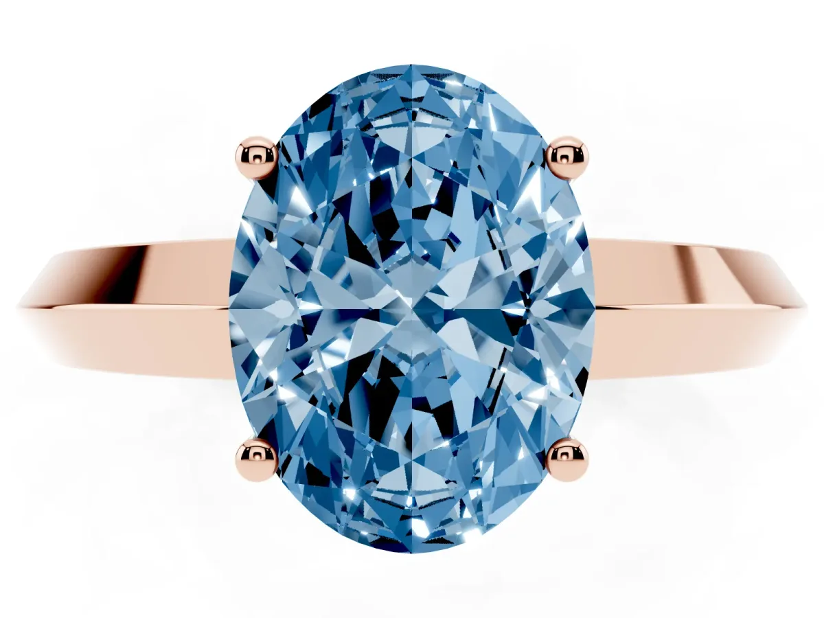 Fancy Blue Oval Cut Cut Solitaire Engagement Ring with Flat Band and Four-Prong Setting Rose gold