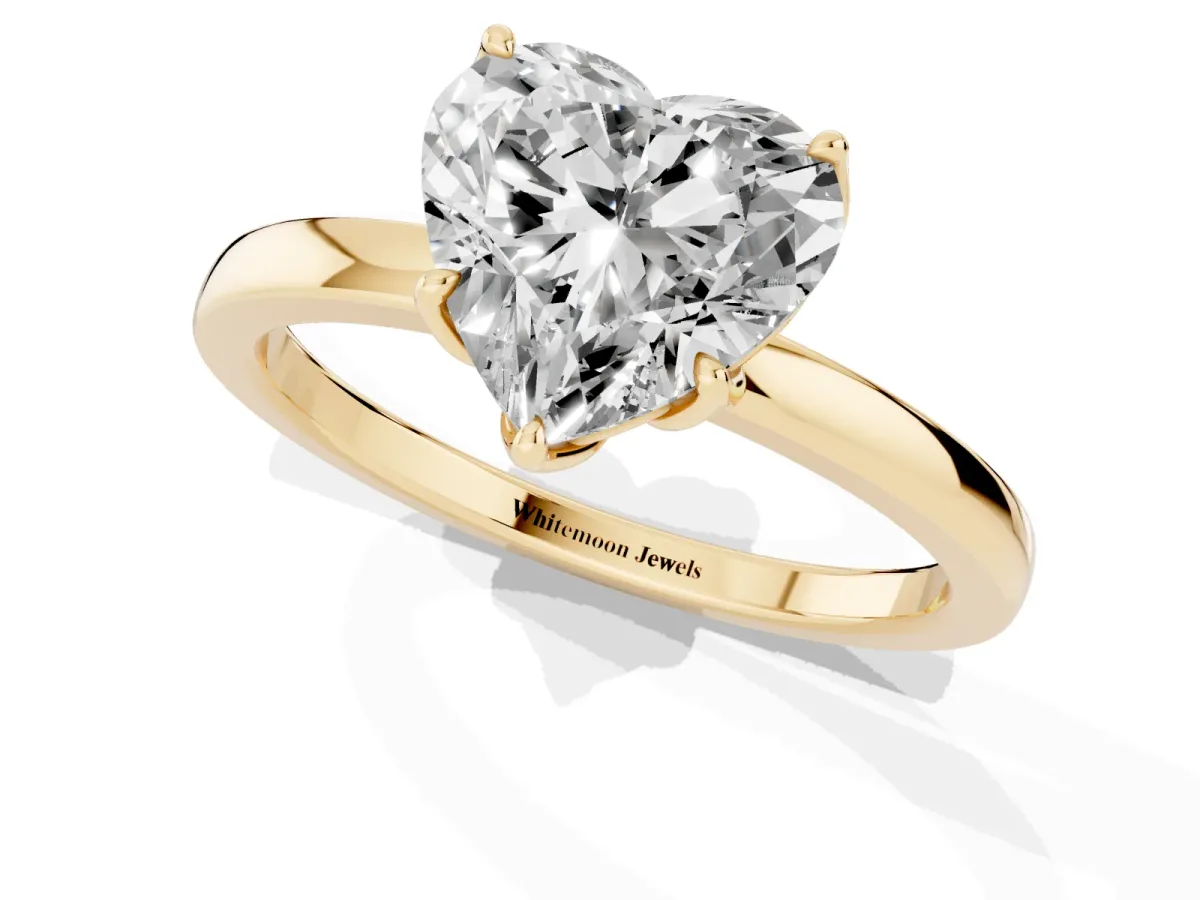 Heart Cut Diamond Solitaire Ring with Thin Band and Prong Setting Yellow gold