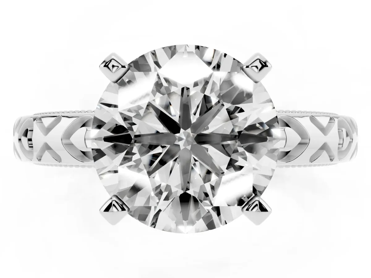 Round Cut Solitaire Diamond Engagement Ring with XO Engraved Band and Four-Prong Setting Silver