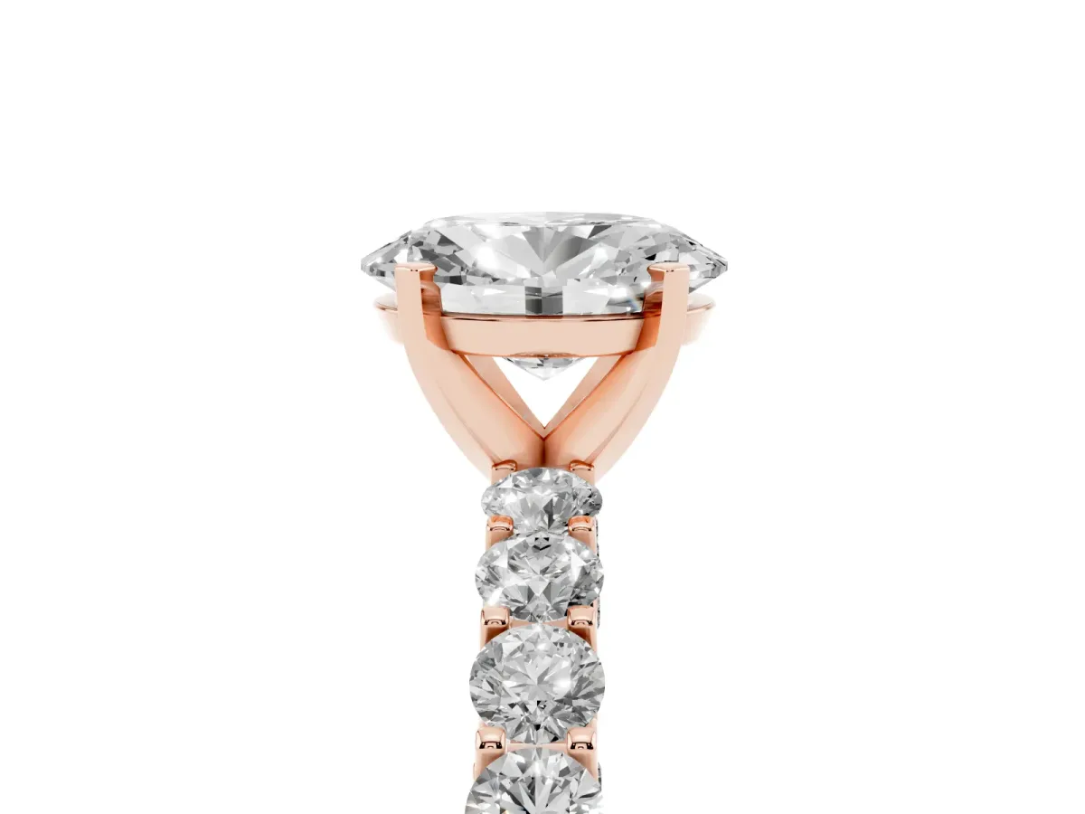 Oval Cut Diamond Solitaire Ring with Shared Prong Pavé Band and Four-Prong Setting Rose gold