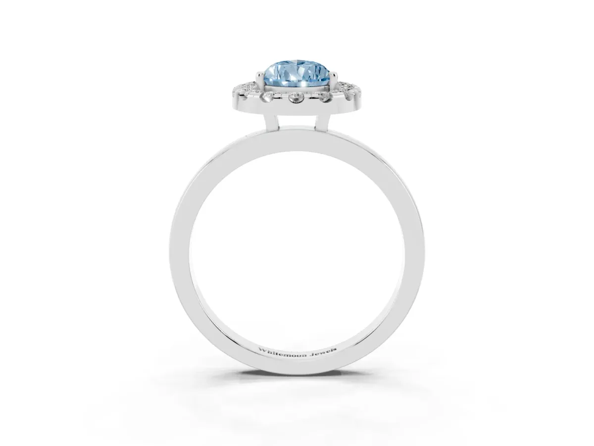 Fancy Blue Pear Cut Halo Diamond Solitaire with Pavé Band and Four-Prong Setting Silver