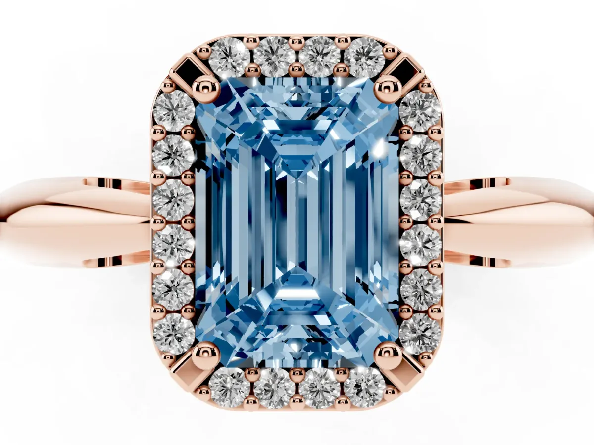 Fancy Blue Emerald Cut Cut Diamond Halo Engagement Ring with Split Shank and Four-Prong Setting Rose gold