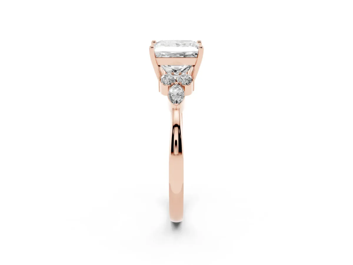 Princess Cut Brilliant Diamond Solitaire Ring with Pear Side Stones and Four-Prong Setting Rose gold