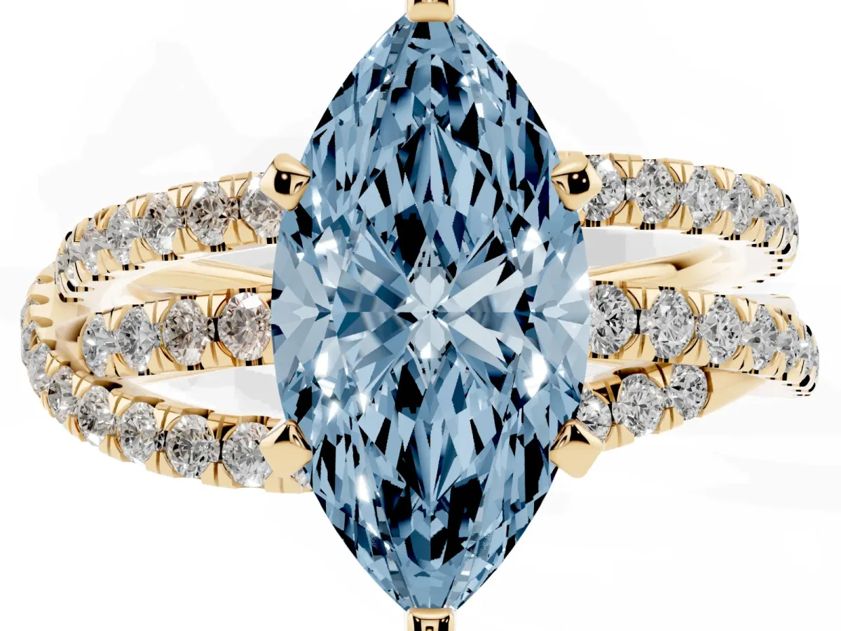 Fancy Blue Marquise Cut Solitaire Twist Band with Pavé Setting and Four-Prong Setting Yellow gold