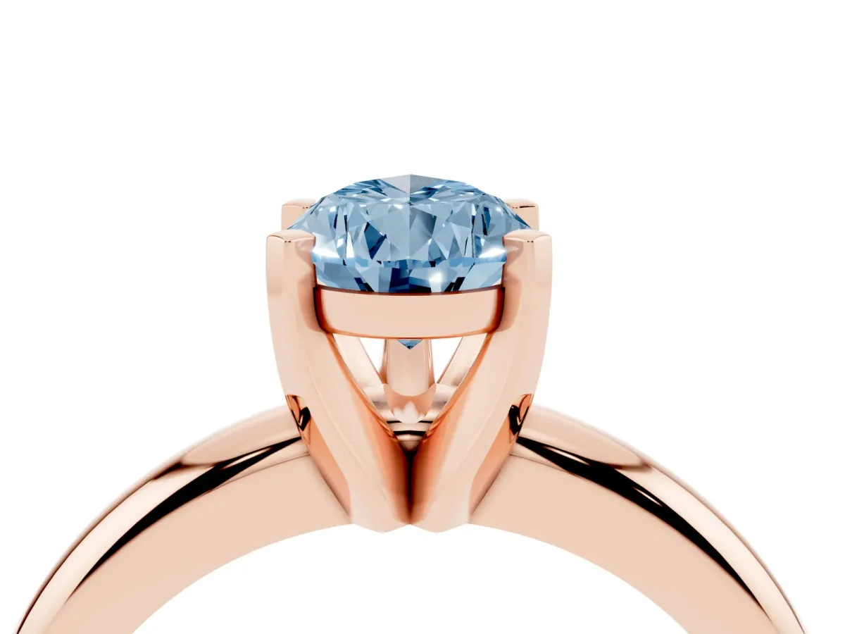 Fancy Blue Pear Cut Diamond Solitaire Engagement Ring with Round Band and Four-Prong Setting Rose gold