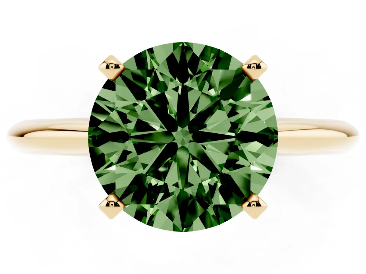 Fancy Green Round Cut Cut Solitaire Ring with Four-Prong Setting on a Classic Band Yellow gold