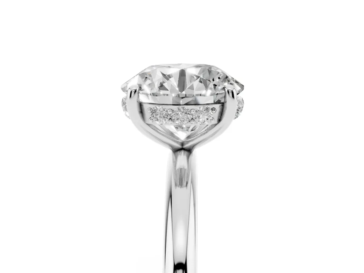 Round Cut Solitaire Diamond Ring with a Classic Band and Four-Prong Setting Platinum