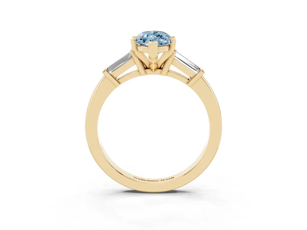 Fancy Blue Marquise Cut Cut Diamond Solitaire Ring with Tapered Baguette Accents and Four-Prong Setting Yellow gold