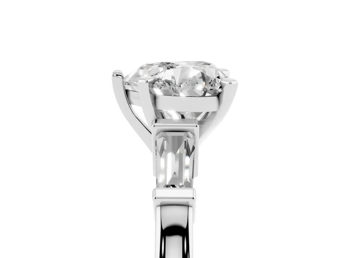 Heart Cut Cut Diamond Solitaire Ring with Tapered Baguette Accents and Four-Prong Setting White gold