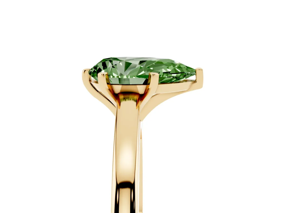 Fancy Green Pear Cut Solitaire Diamond Engagement Ring with Four-Prong Setting on a Classic Band Yellow gold