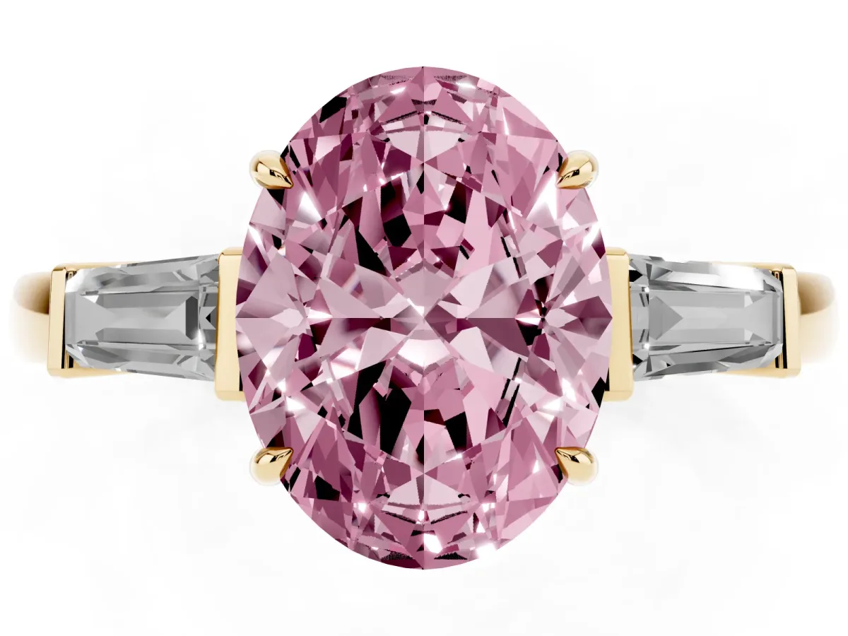 Fancy Pink Oval Cut Diamond Three-Stone Ring with Tapered Baguette Side Stones and Prong Setting Yellow gold