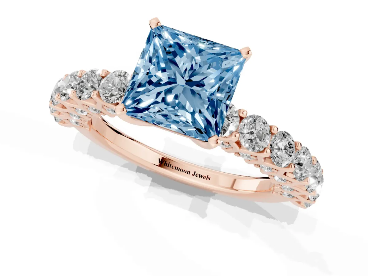 Fancy Blue Princess Cut Diamond Solitaire Ring with Shared Prong Pavé Band and Four-Prong Setting Rose gold