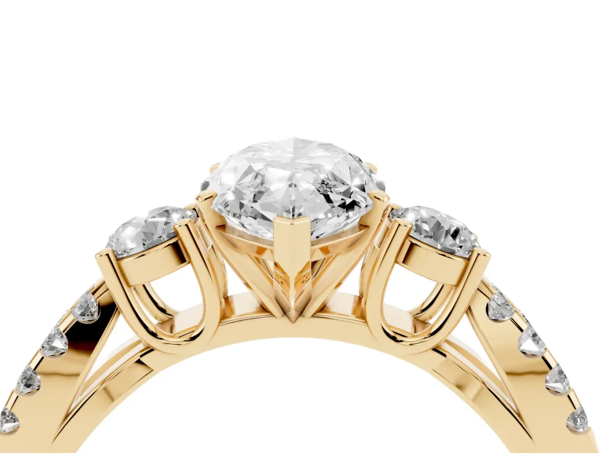 Marquise Cut Diamond Three-Stone Ring with Pavé Split Shank and Four-Prong Setting Yellow gold