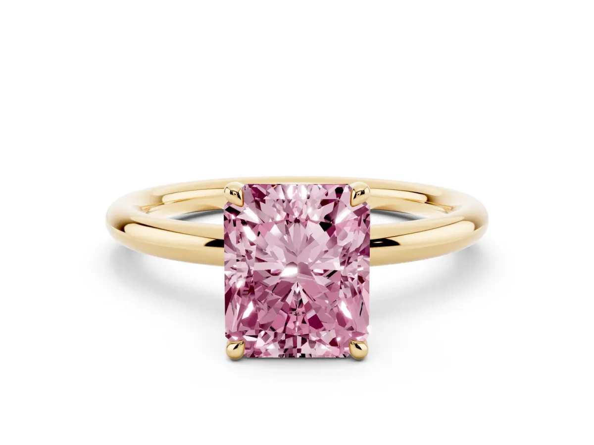 Fancy Pink Radiant Cut Diamond Solitaire Ring with Thin Band and Four-Prong Setting Yellow gold