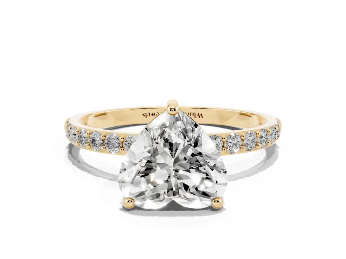 Heart Cut Diamond Solitaire Ring with Round Pavé Band and Prong Setting Yellow gold