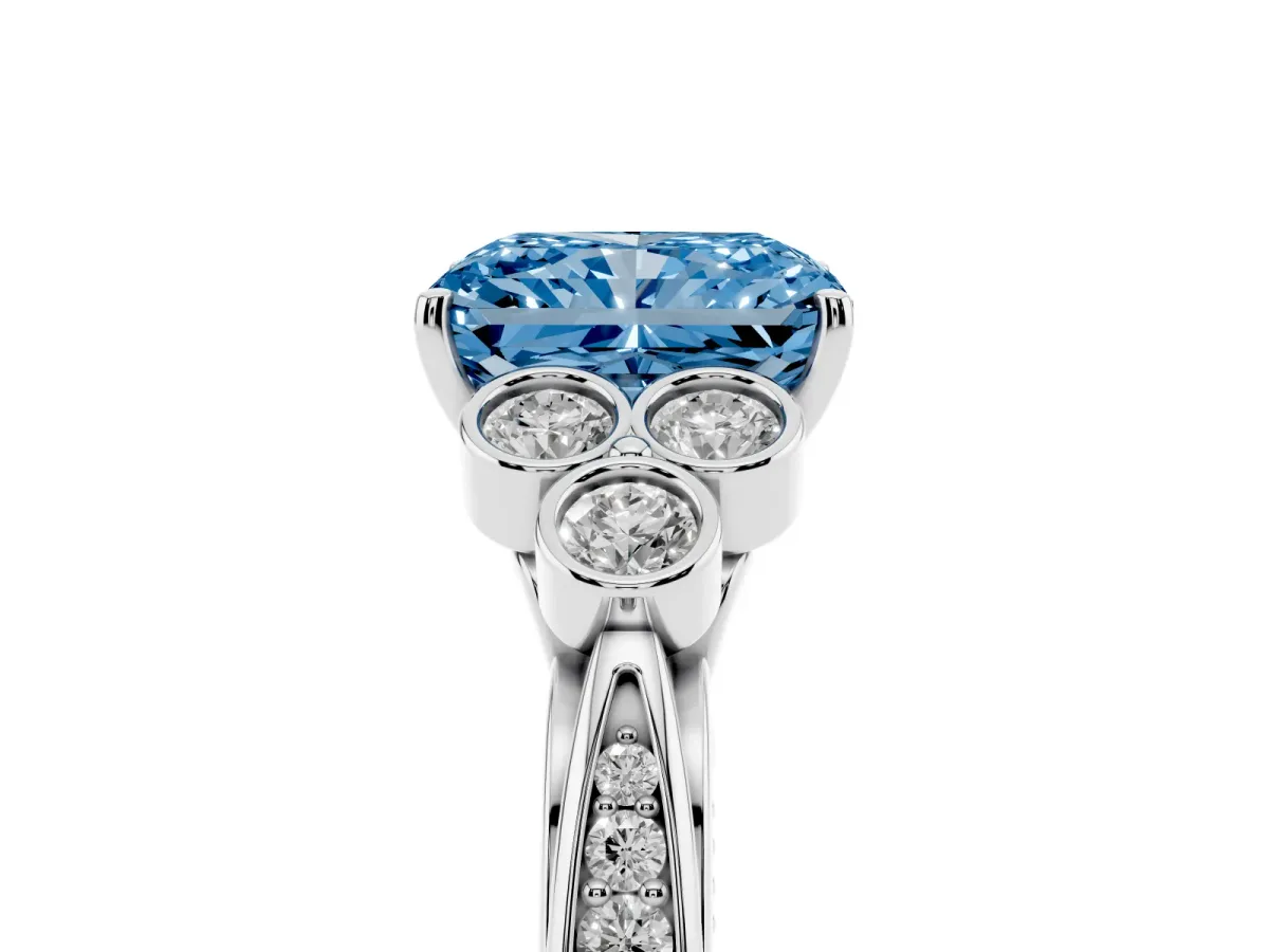 Fancy Blue Radiant Cut Cut Diamond Engagement Ring with Bezel Set Round Side Stones and Prong Setting Platinum