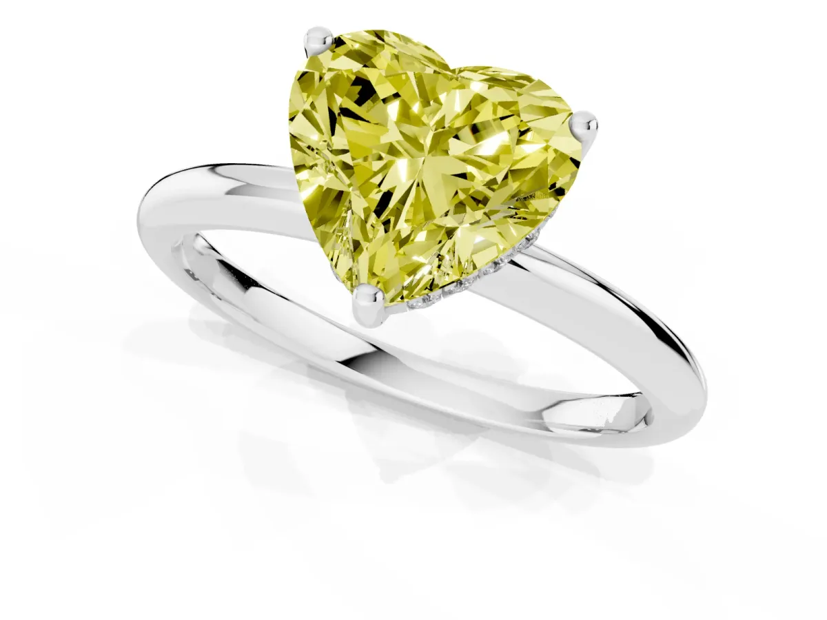 Fancy Yellow Heart Cut Cut Solitaire Engagement Ring with Four-Prong Setting and Classic Band Silver