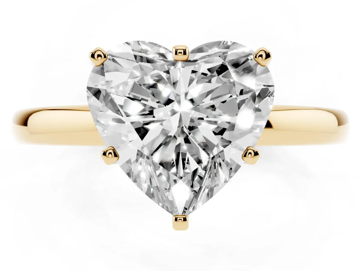 Heart Cut Solitaire Diamond Ring with Six-Prong Setting on a Classic Band Yellow gold