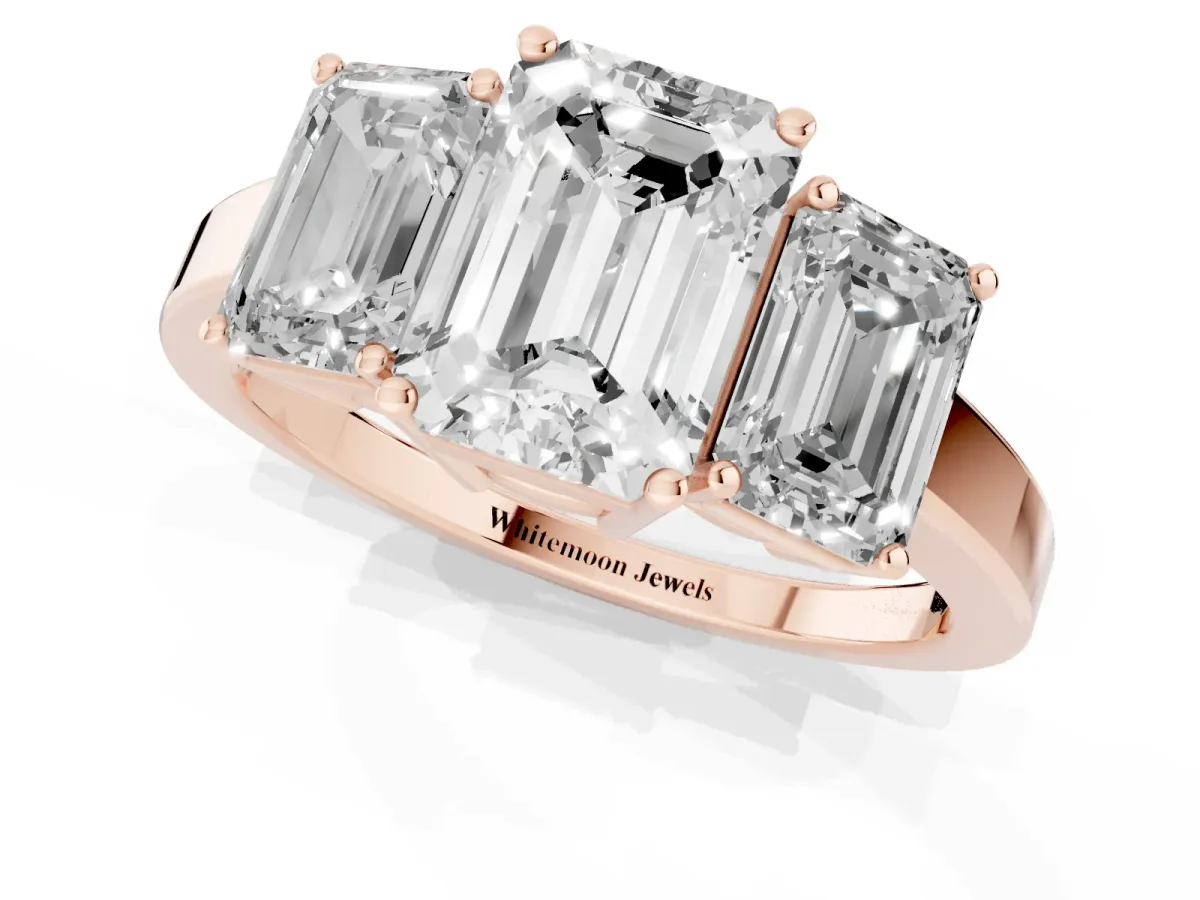 Three-Stone Emerald Cut Cut Diamond Engagement Ring with Flat Band and Four-Prong Setting Rose gold