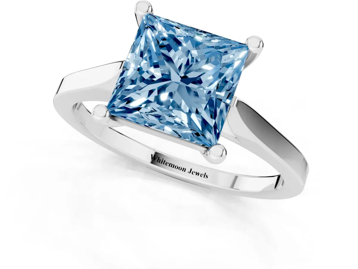 Fancy Blue Princess Cut Solitaire Diamond Ring with Four-Prong Setting and Tapered Band White gold