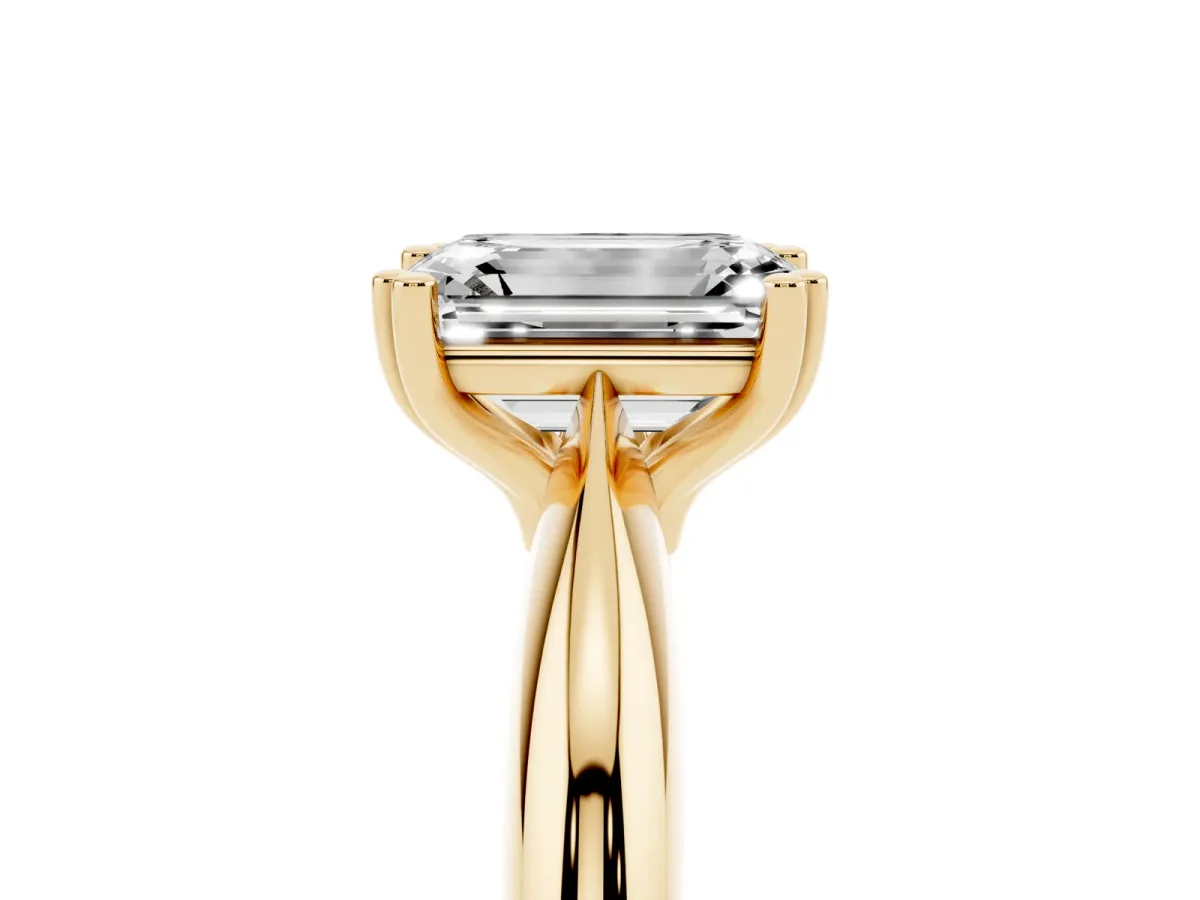 Emerald Cut Cut Solitaire Engagement Ring with Tapered Band and Four-Prong Setting Yellow gold