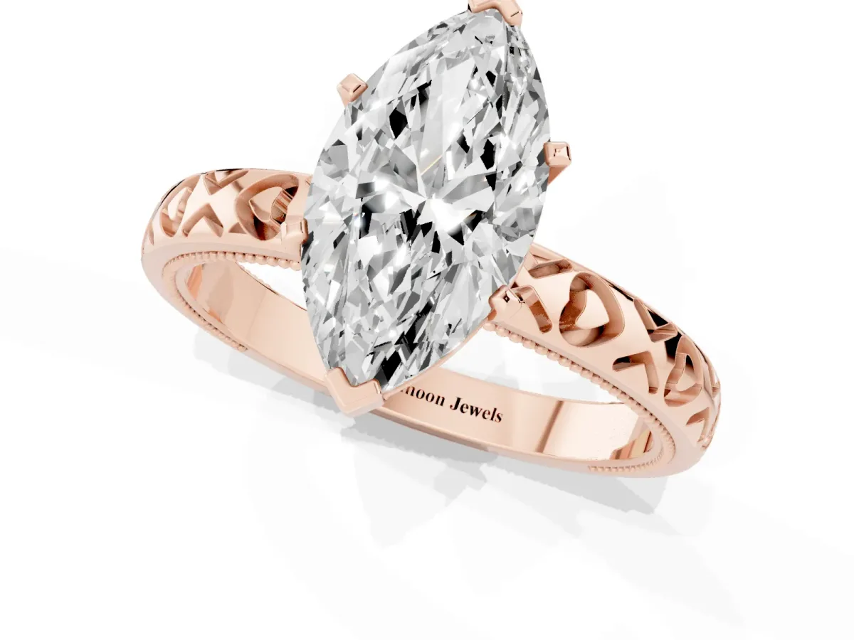 Marquise Cut Solitaire Diamond Engagement Ring with XO Engraved Band and Four-Prong Setting Rose gold