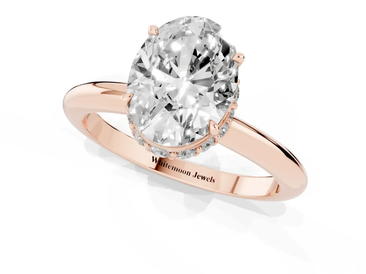 Oval Cut Brilliant Solitaire Engagement Ring with Six-Prong Setting and Classic Band Rose gold