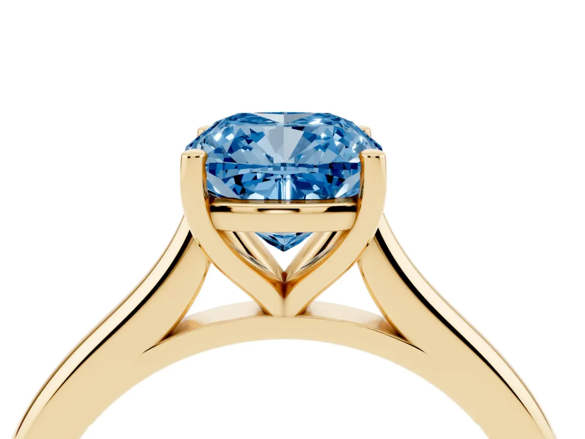 Fancy Blue Cushion Cut Cut Solitaire Ring with Cathedral Band and Four-Prong Setting Yellow gold
