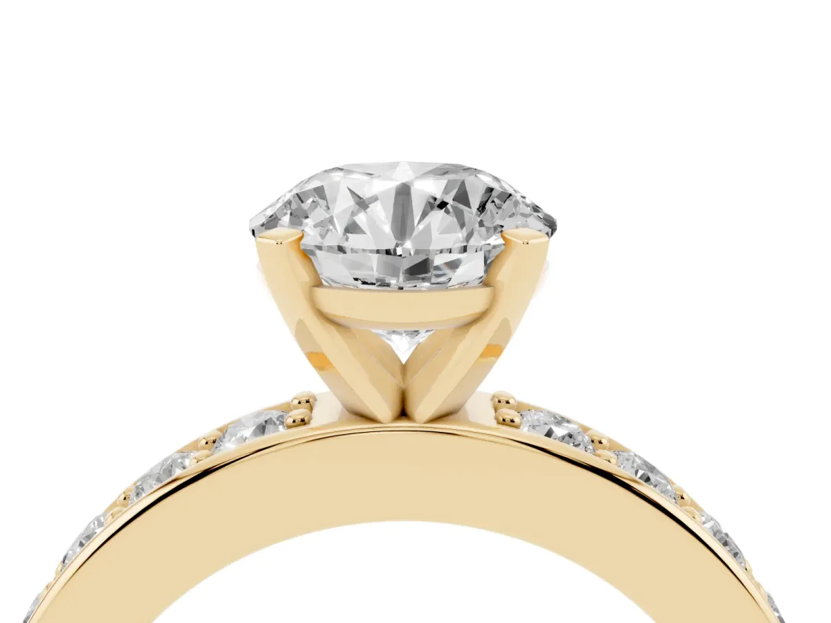 Round Cut Diamond Engagement Ring with Channel Set Round Band and Prong Setting Yellow gold