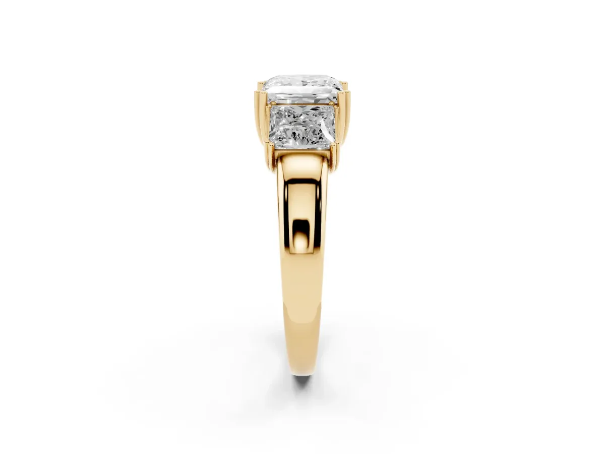 Three-Stone Princess Cut Cut Diamond Ring with Channel Set Band and Four-Prong Setting Yellow gold