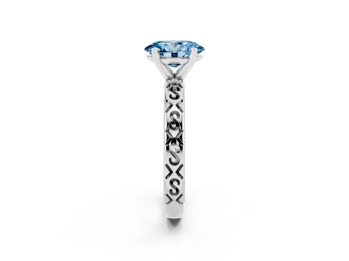 Fancy Blue Oval Cut Solitaire Engagement Ring with Scrollwork Band and Four-Prong Setting Silver