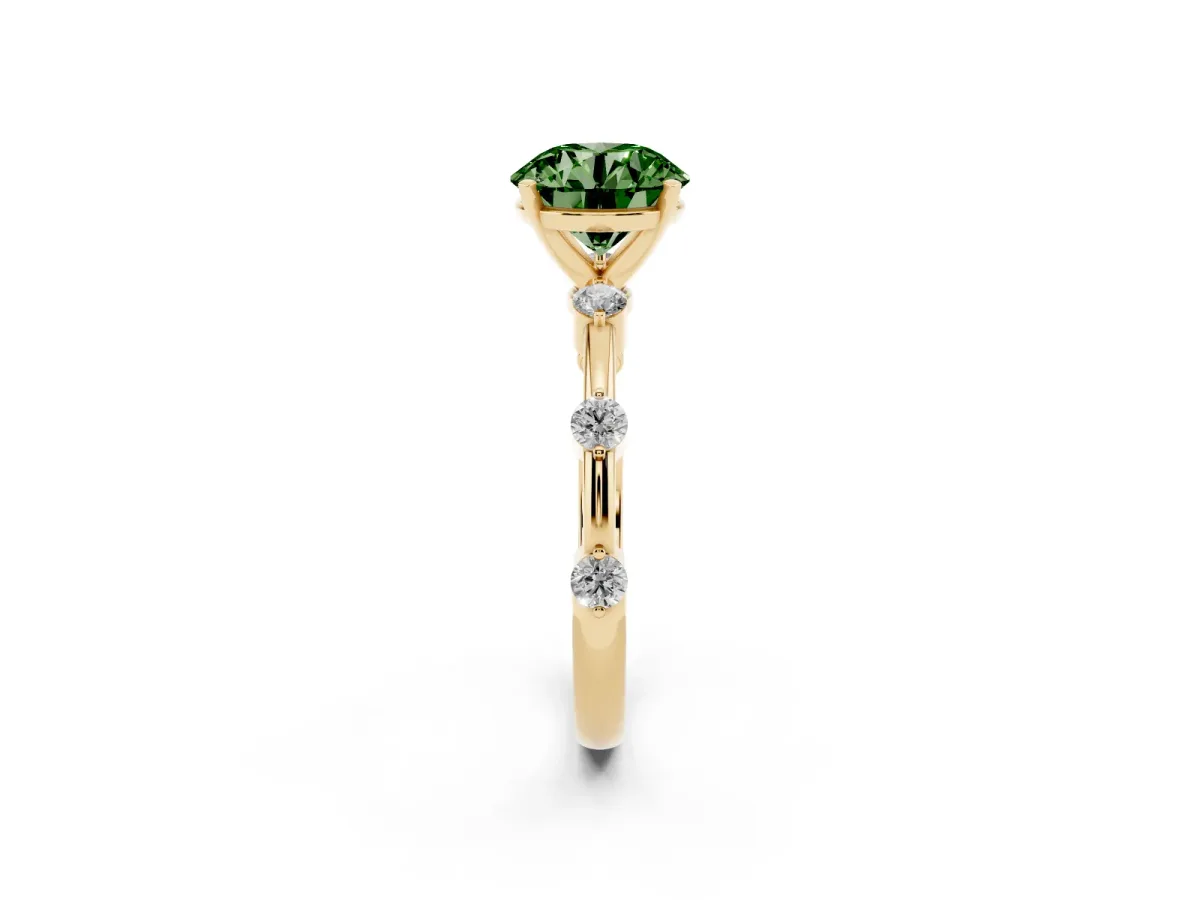 Fancy Green Round Cut Solitaire Diamond Ring with Bezel Set Side Stones and Prong Setting Yellow gold