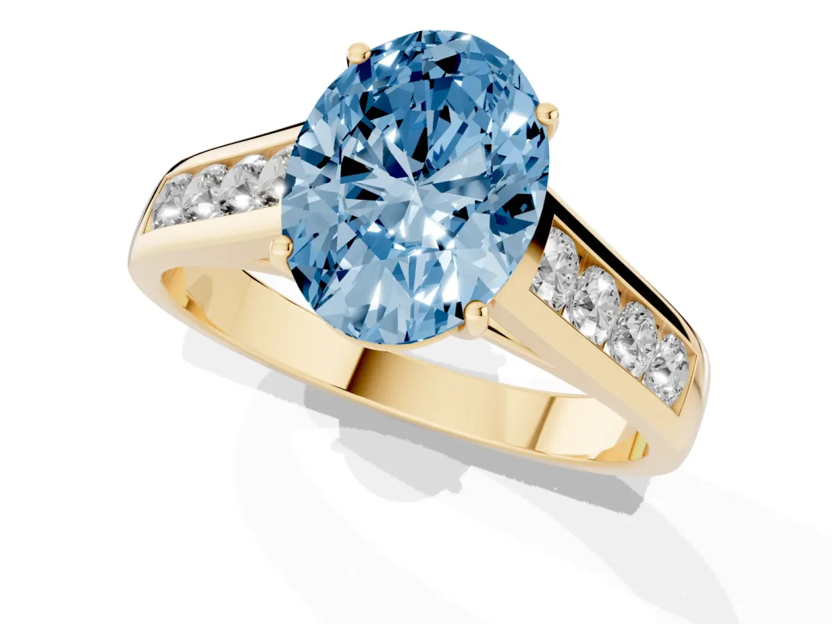 Fancy Blue Oval Cut Solitaire Channel-Set Diamond Engagement Ring with Four-Prong Setting Yellow gold