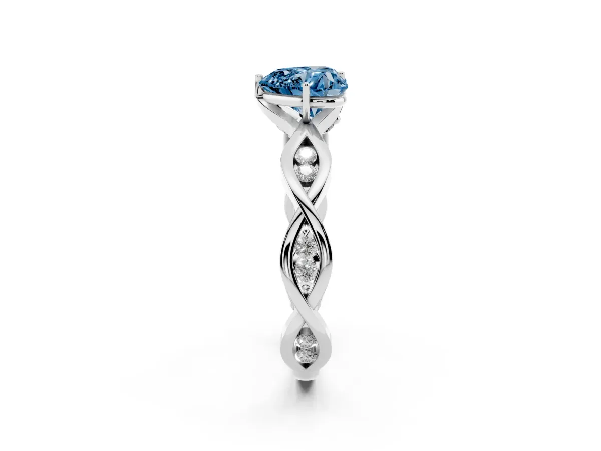Fancy Blue Heart Cut Solitaire Twist Band with Leaf Prong Setting Platinum