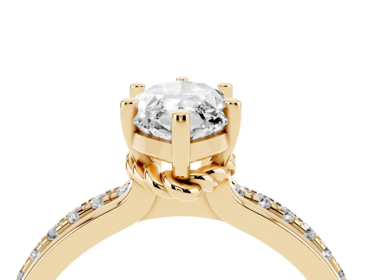 Marquise Cut Solitaire Diamond Ring with Channel Set Band and Six-Prong Setting Yellow gold