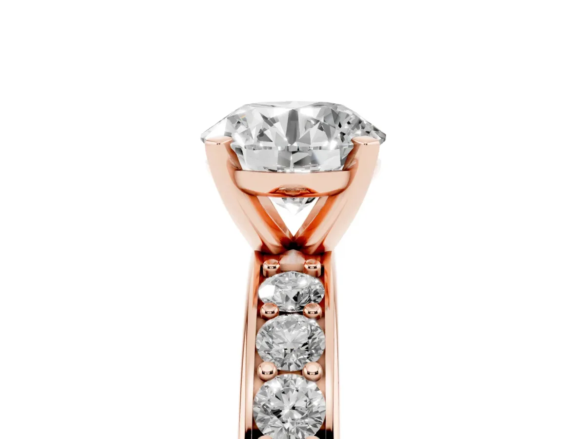Round Cut Diamond Engagement Ring with Channel Set Round Band and Prong Setting Rose gold