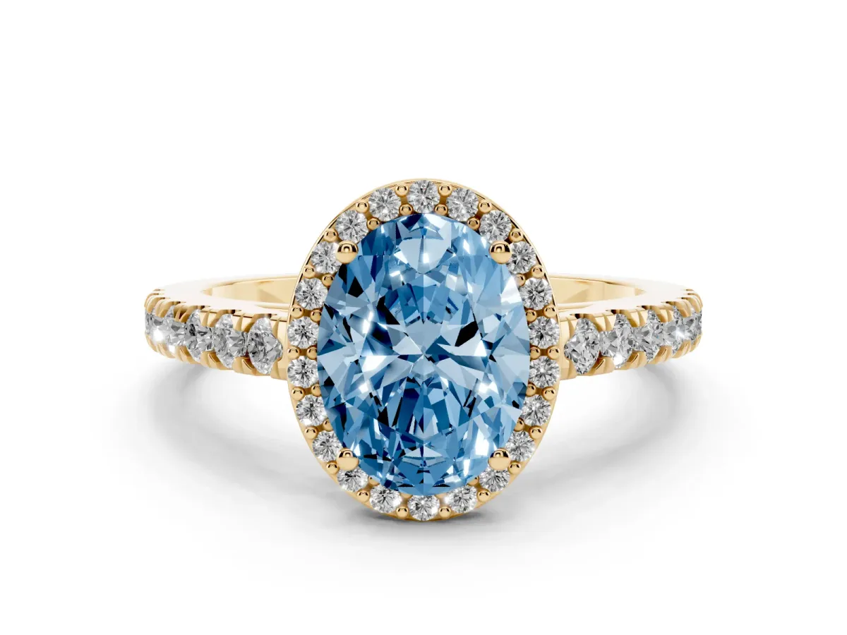 Fancy Blue Oval Cut Cut Halo Diamond Engagement Ring with Pave Band and Four-Prong Setting Yellow gold