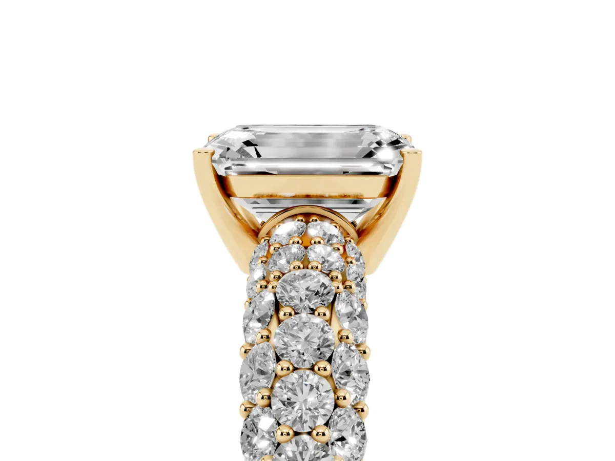 Emerald Cut Diamond Pavé Band Solitaire Ring with Four-Prong Setting Yellow gold